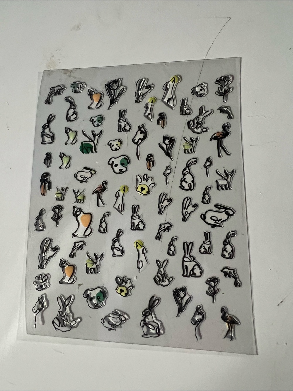 Clear-backed nail art stickers